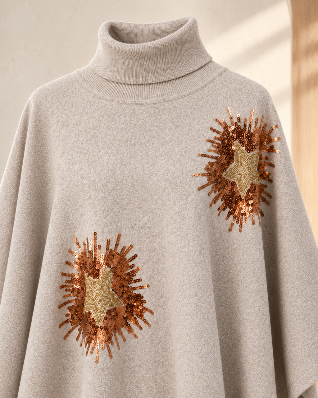 Embellished Poncho Sweater – turtleneck detail