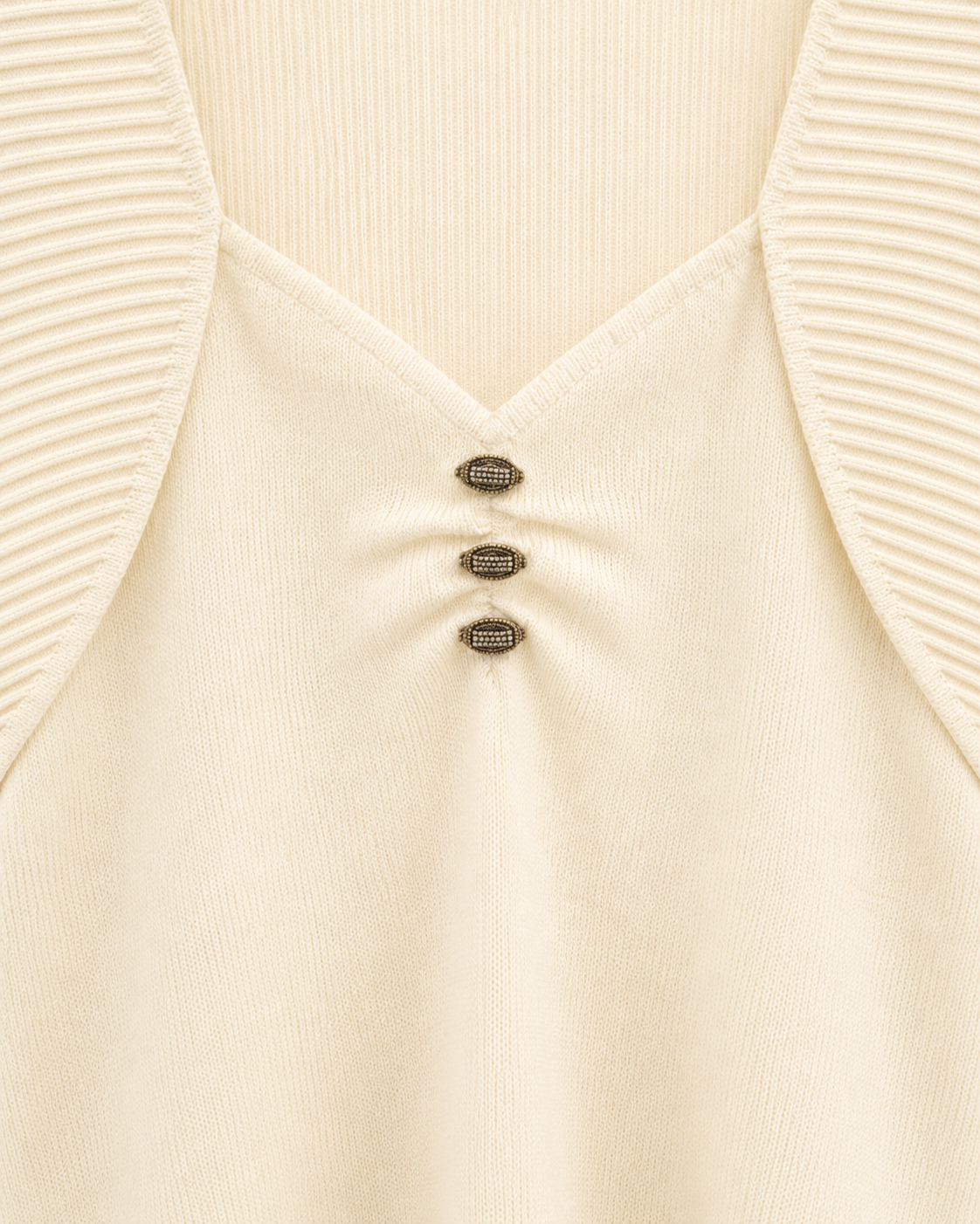 Feather Sleeve Knit Top – neckline buttons detail
