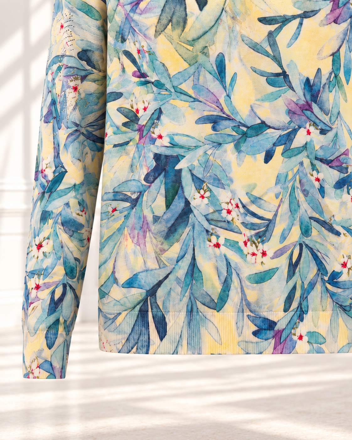 Overall Leaf Print Top – print hem detail