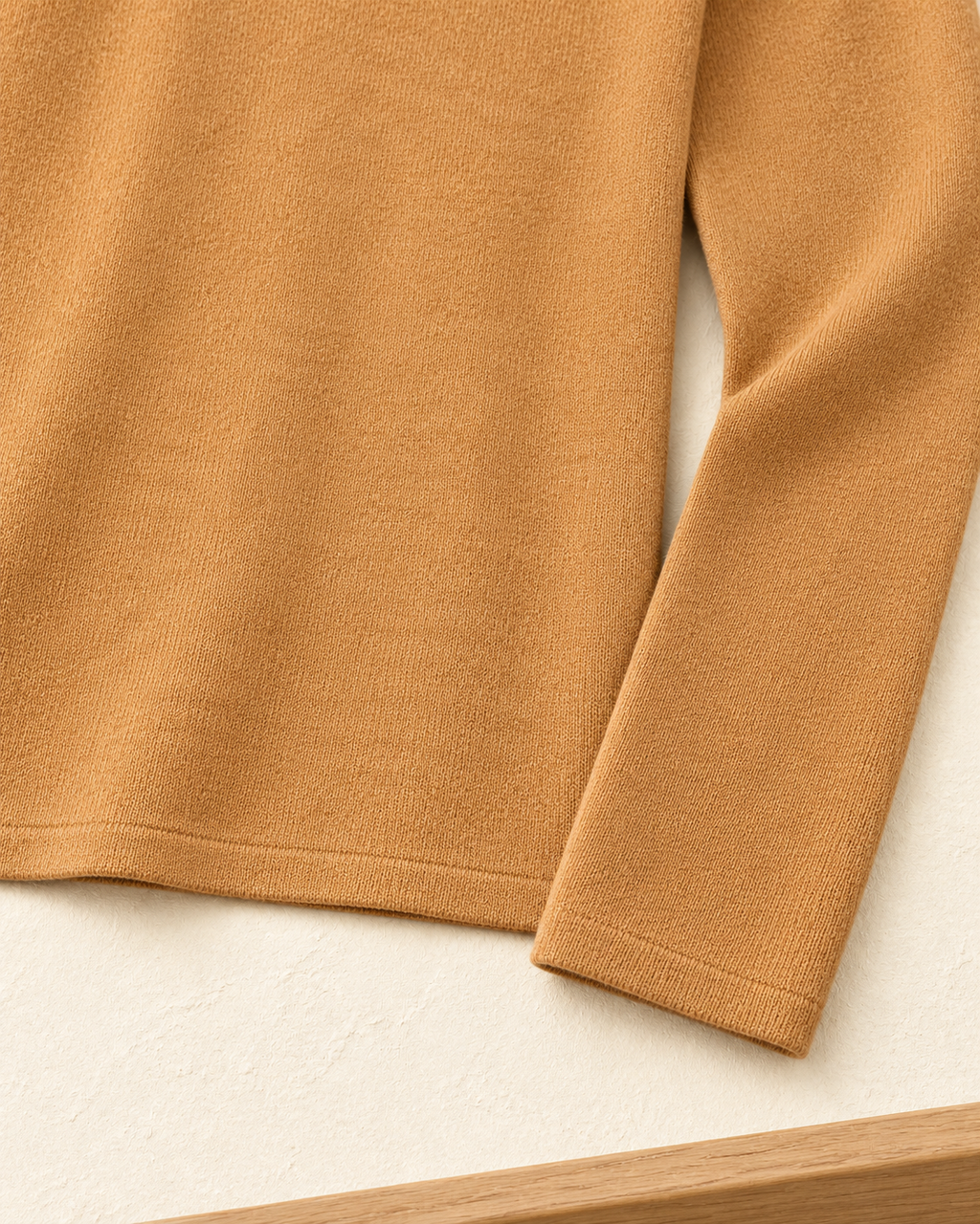 Pendant Knit Top – hem sleeve detail