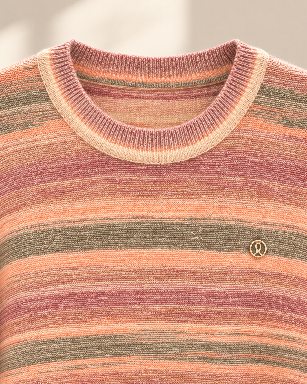 Striped Pullover – neck emblem detail